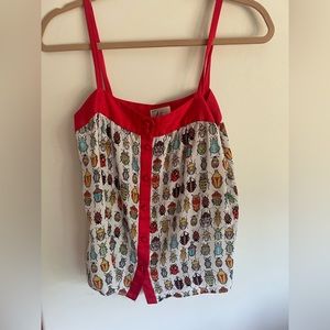 Milly silk “bug blouse.”